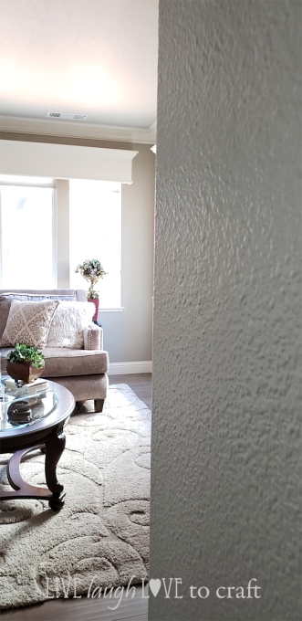 living-room-makeover-lowes-valspar-ashen-gray-paint-on-walls.jpg