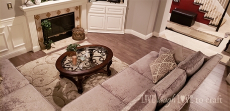 living-room-sofas-for-less-gray-laminate-florring-update-after.jpg